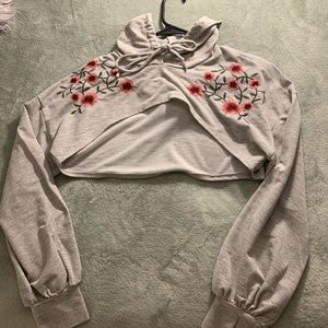 Cropped flower design sweater